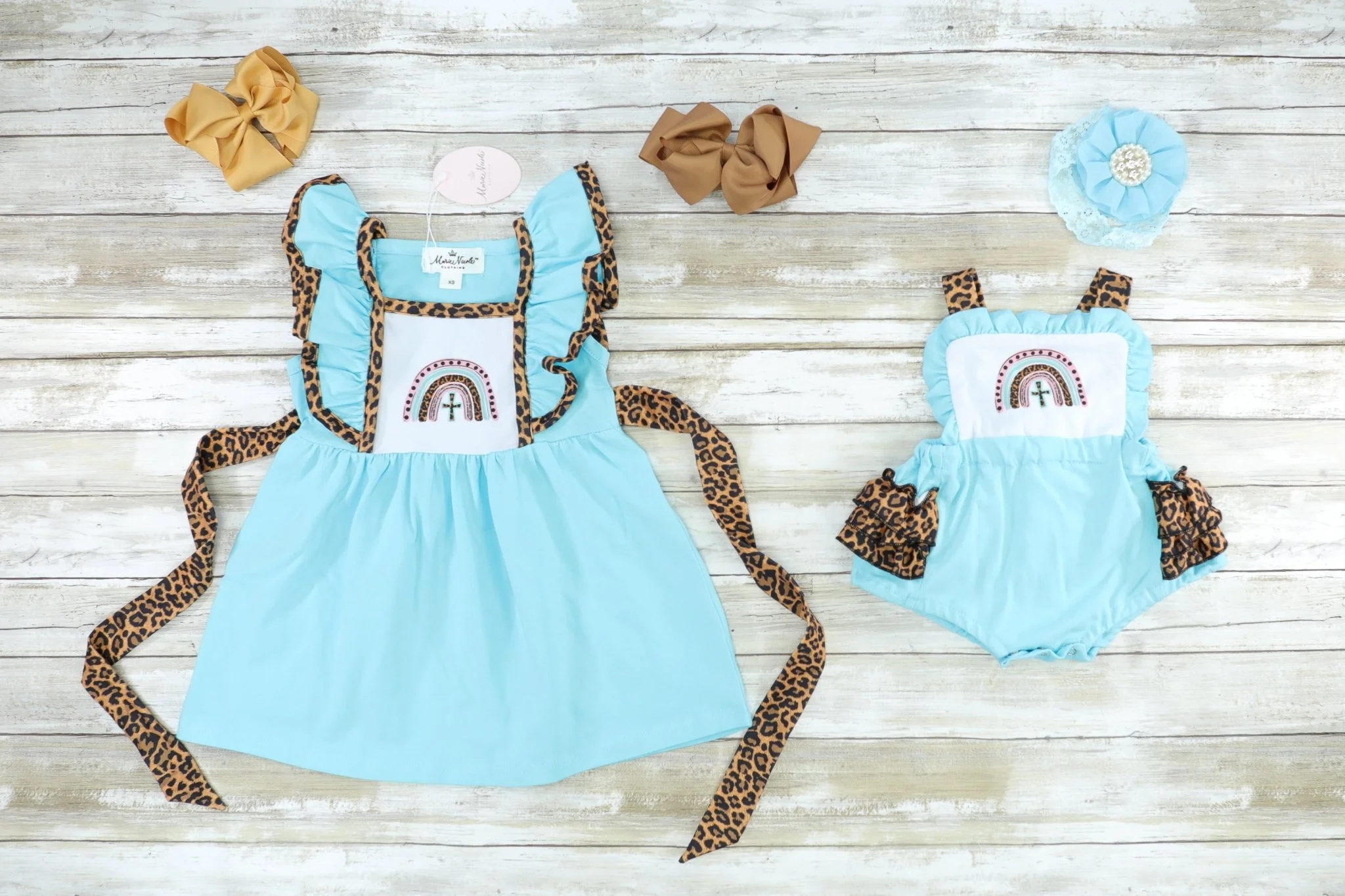 Blue Rainbow Cross Apron Bubble Romper - Image 3