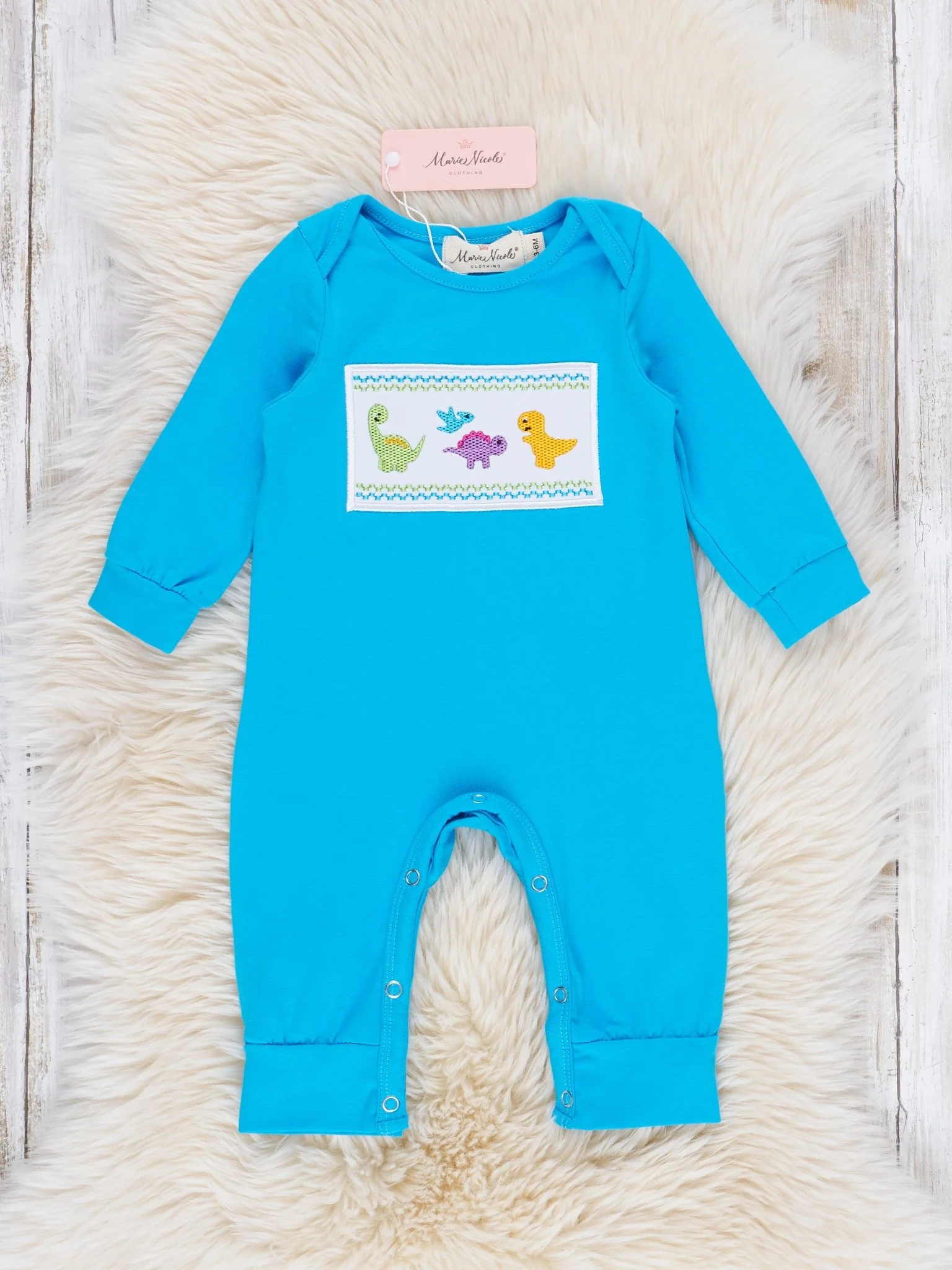 Blue Smocked Dinosaurs Romper