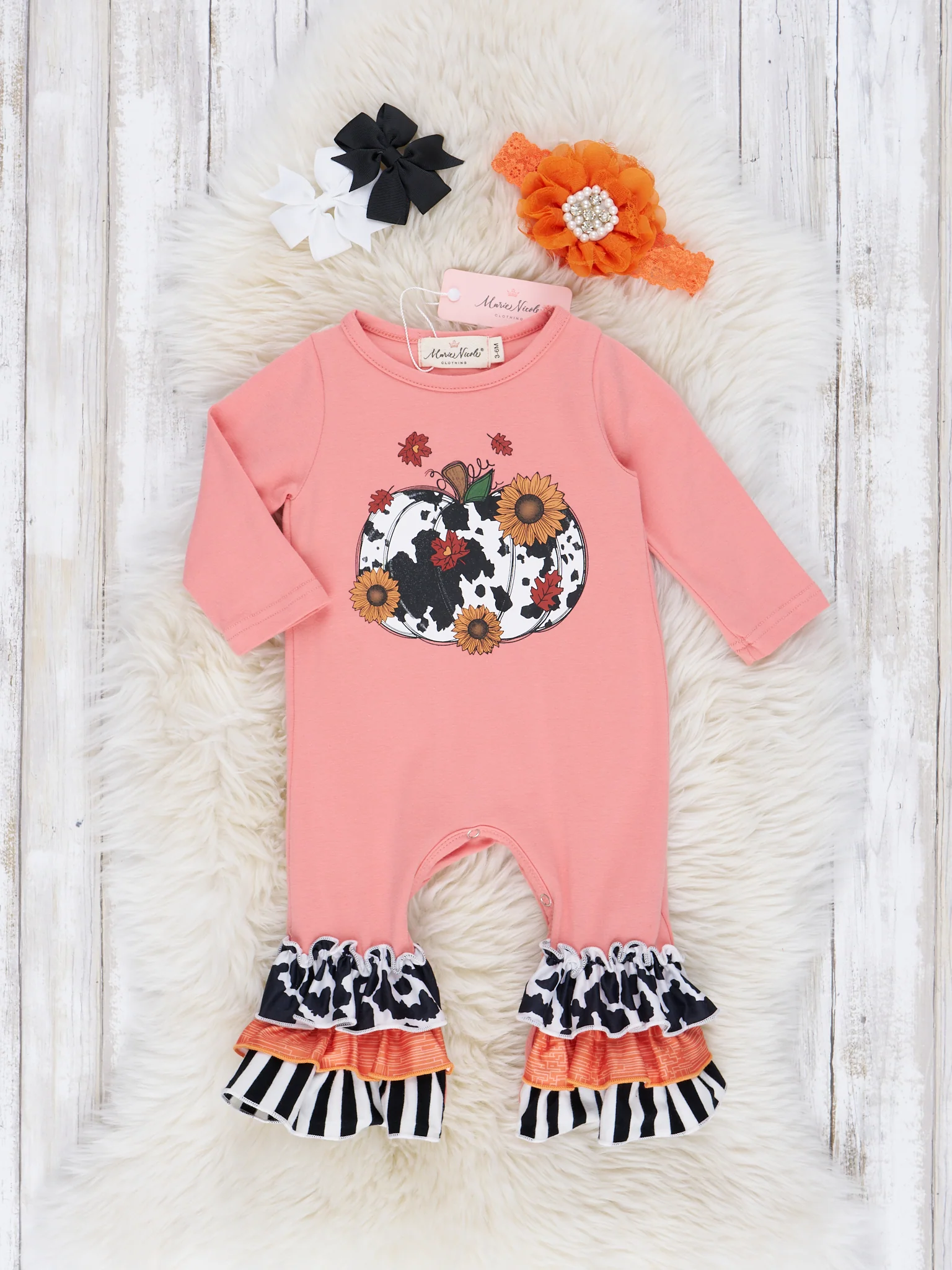 Coral Cow Print Pumpkin Ruffle Romper