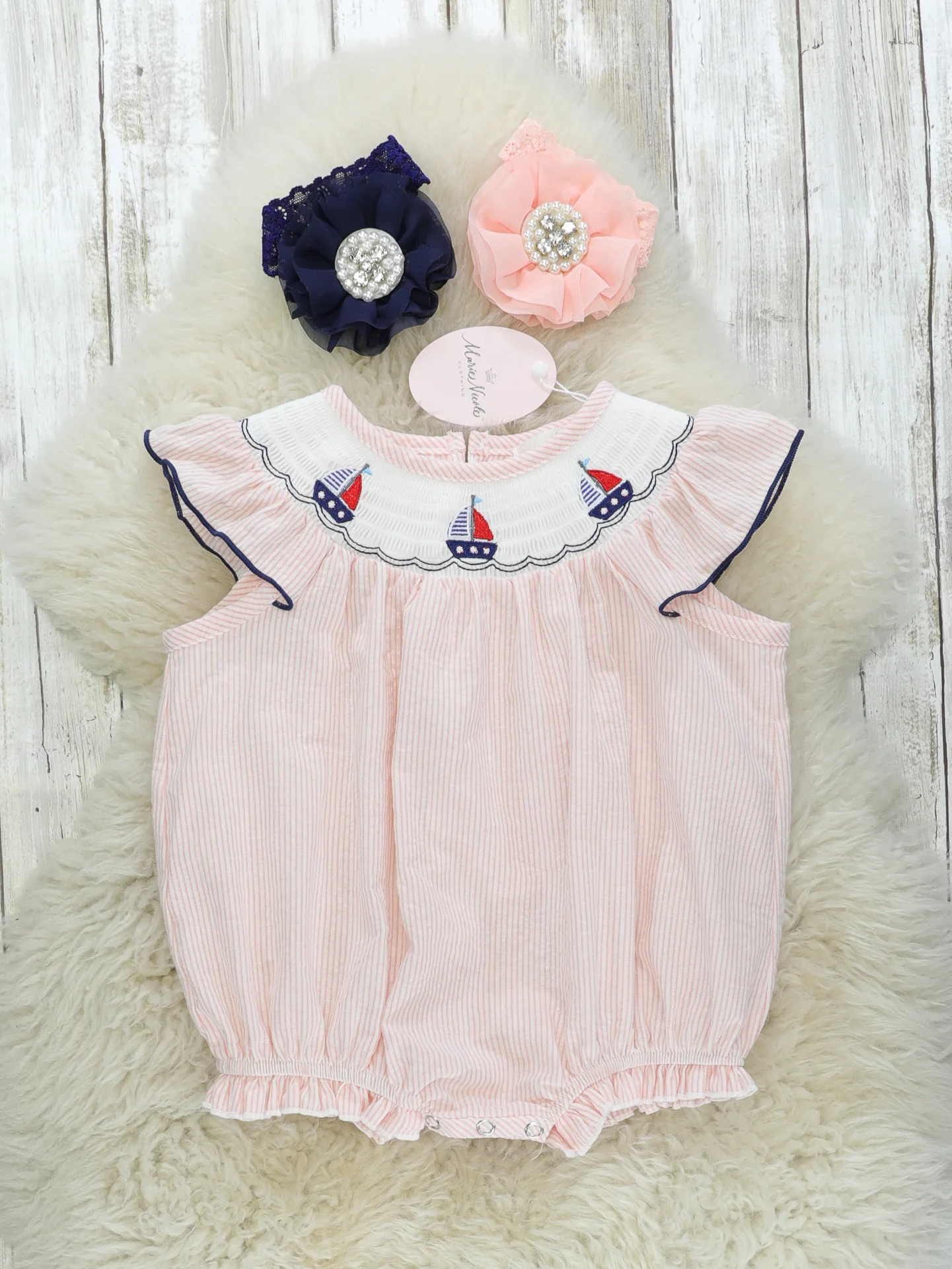 Coral Sailboat Smocked Romper