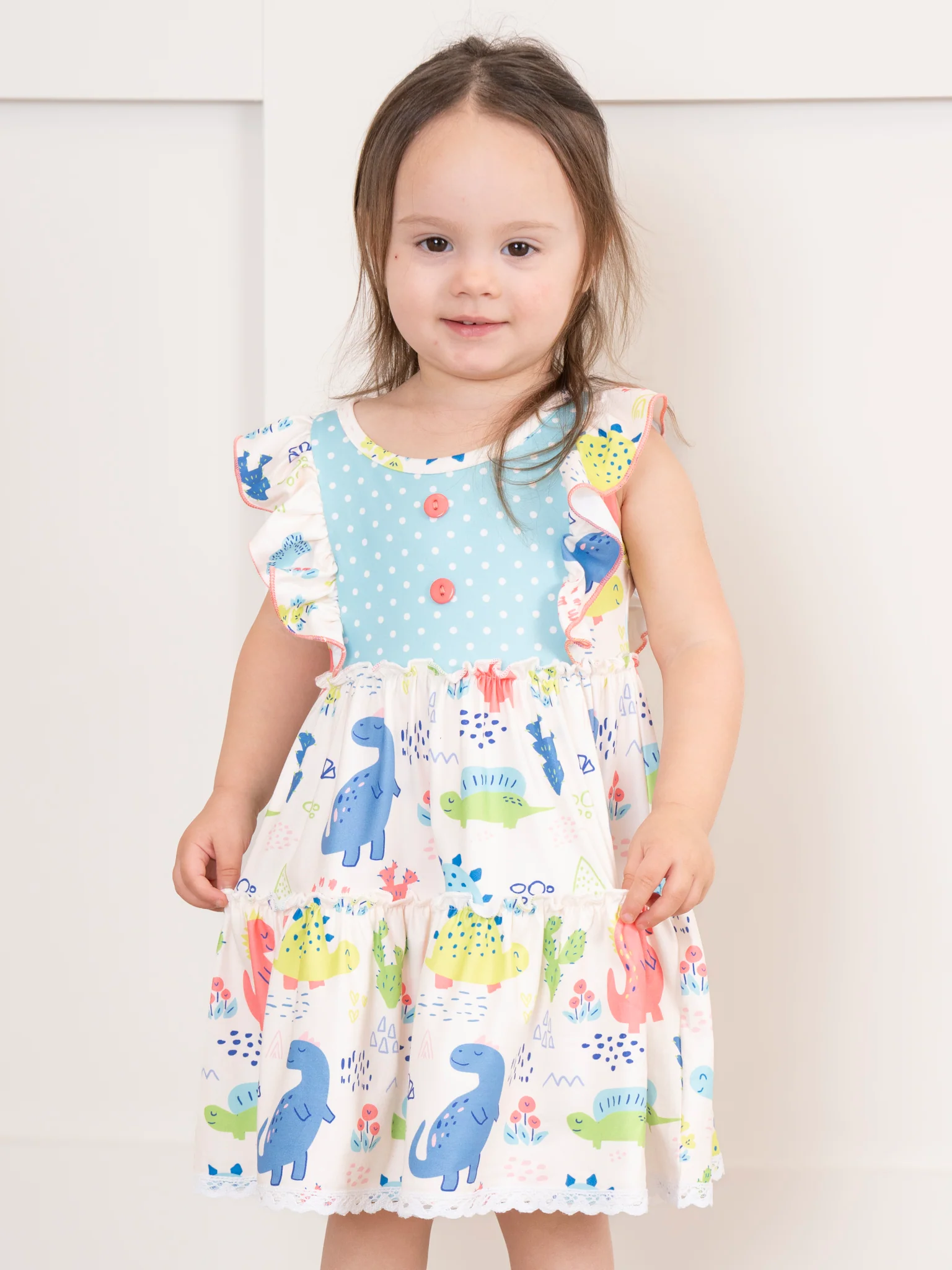 Coral & Teal Dinosaur World Ruffle Dress