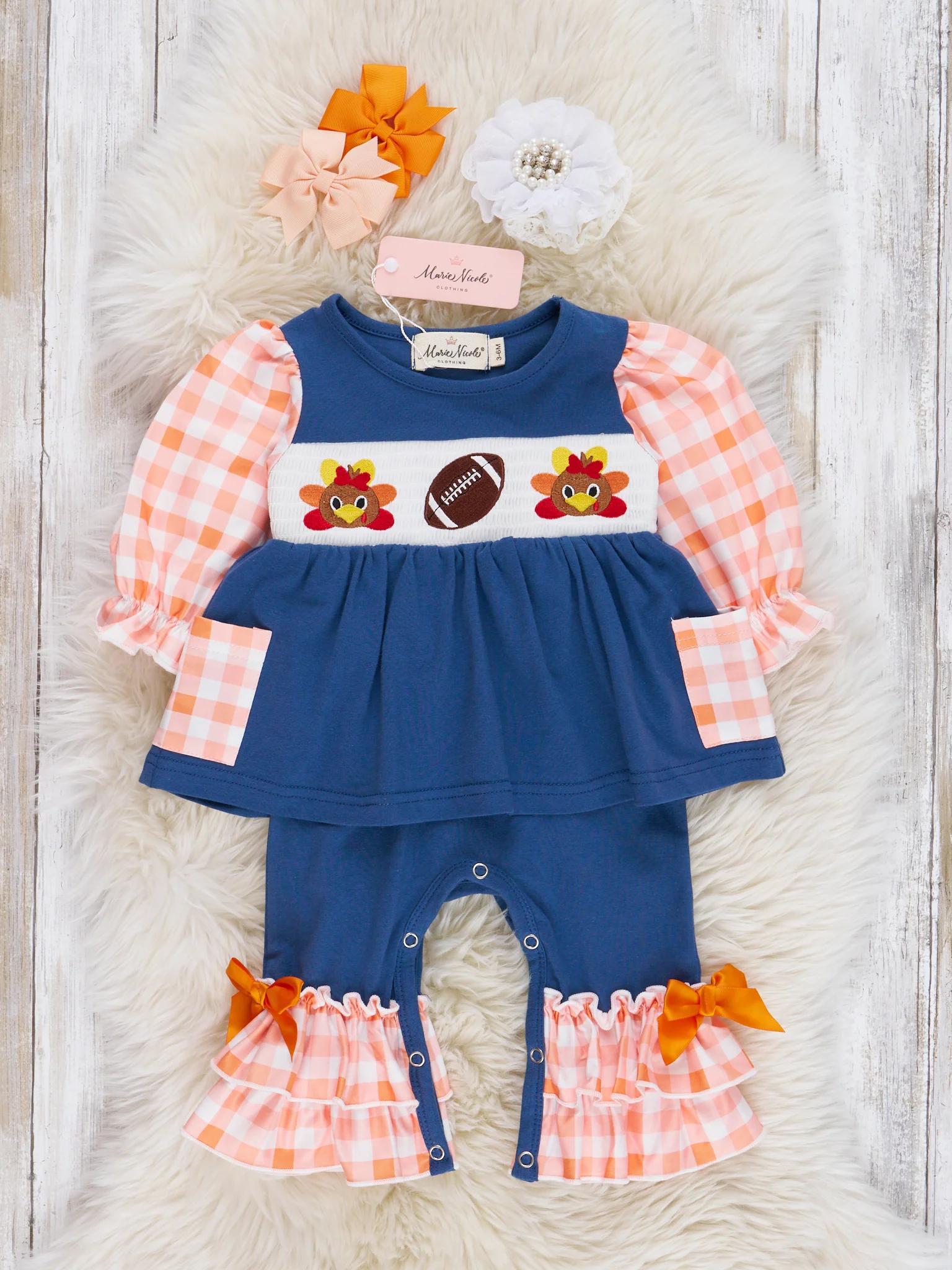 Navy & Orange Plaid Smocked Football Ruffle Romper
