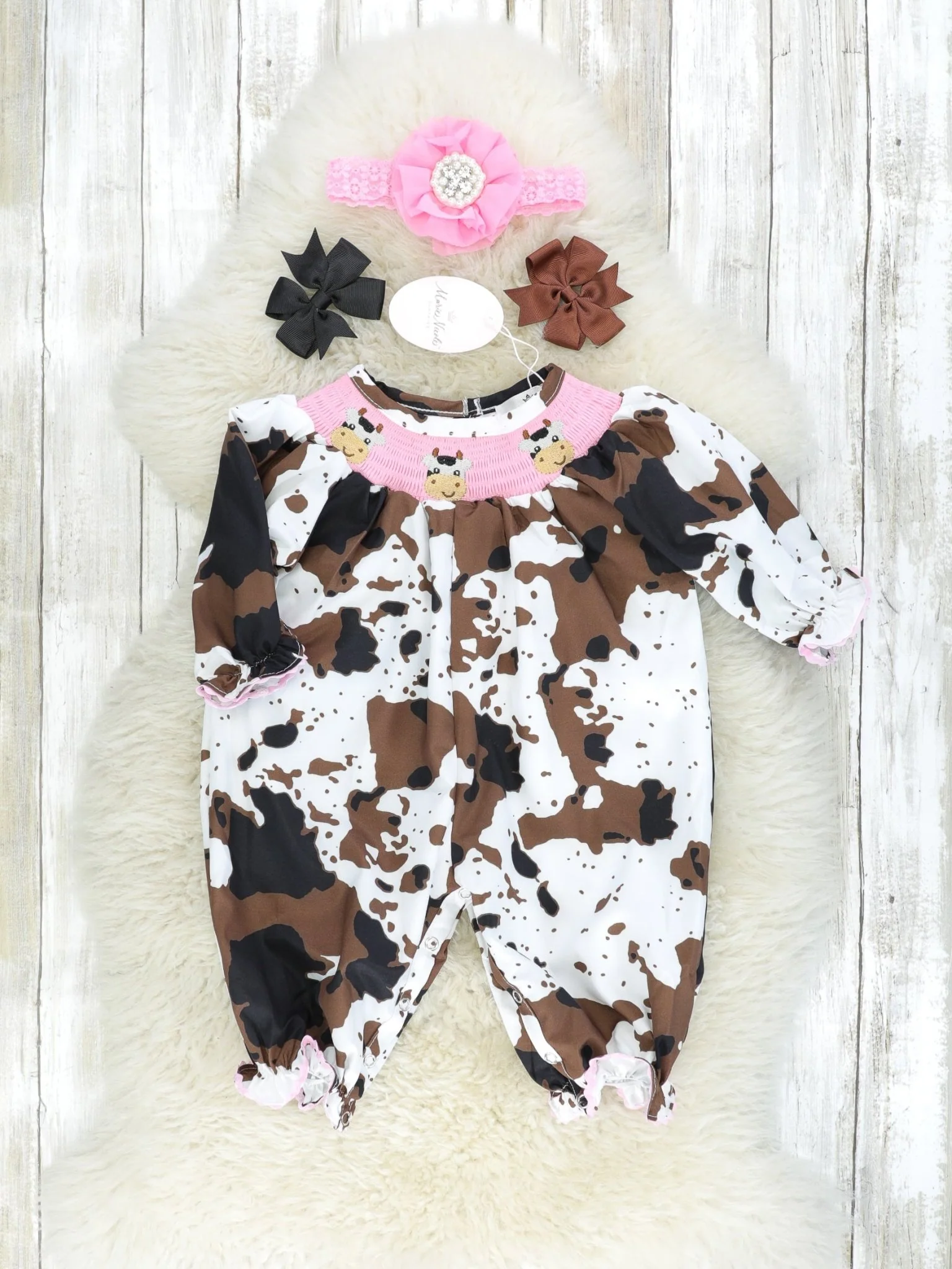 Pink Smocked Cow Print Romper