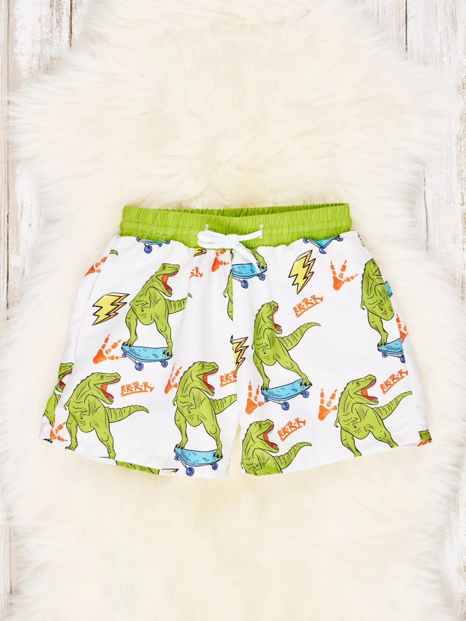 Skateboarding T-Rex Swim Trunks