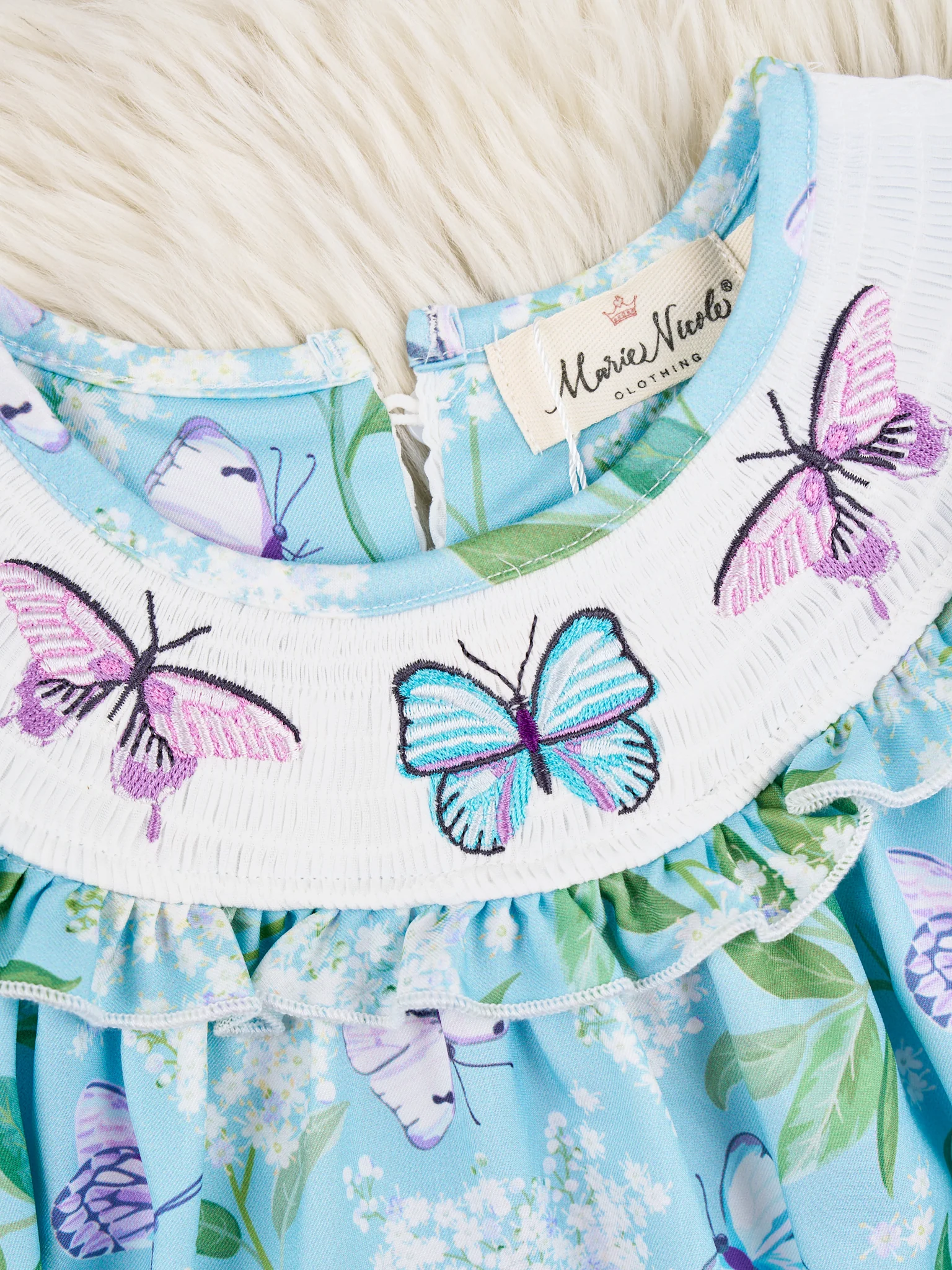 Smocked Blue Butterfly Romper - Image 3