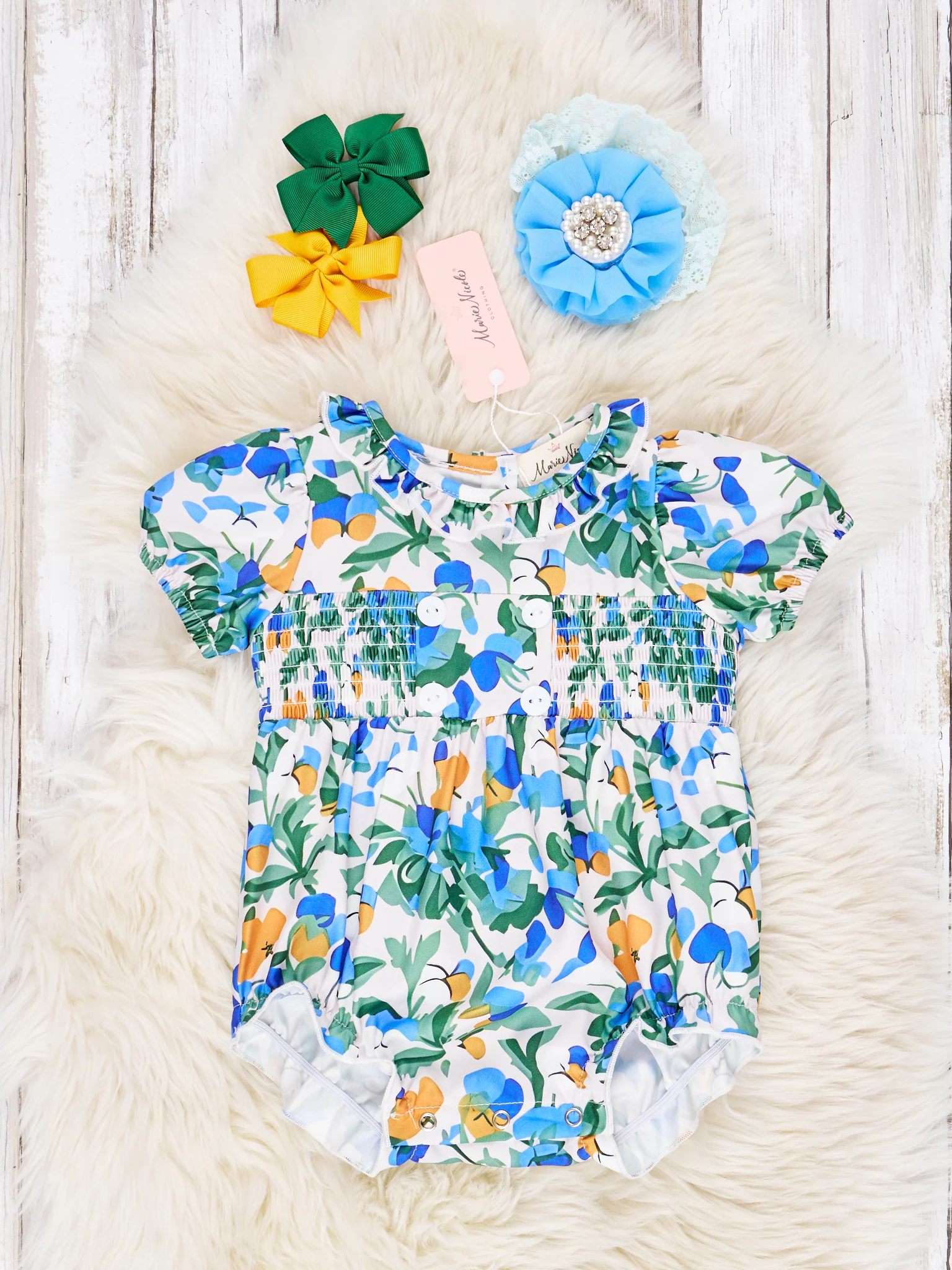 Smocked Royal Blue Floral Ruffle Romper