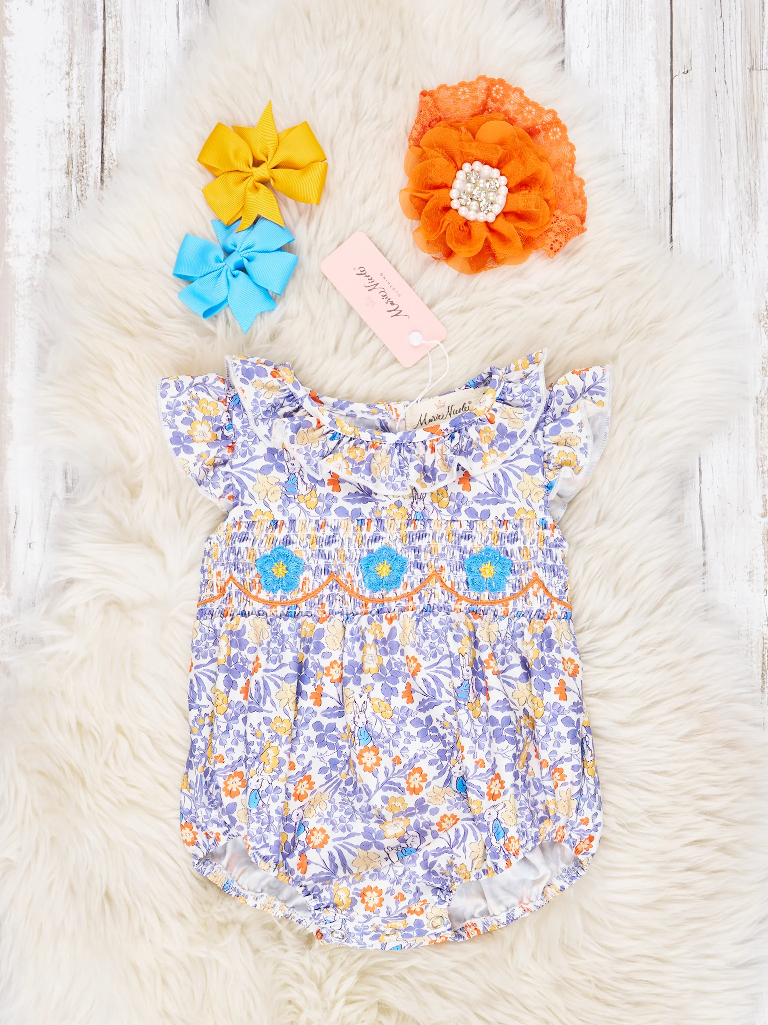 Smocked Yellow Floral Tie Ruffle Romper