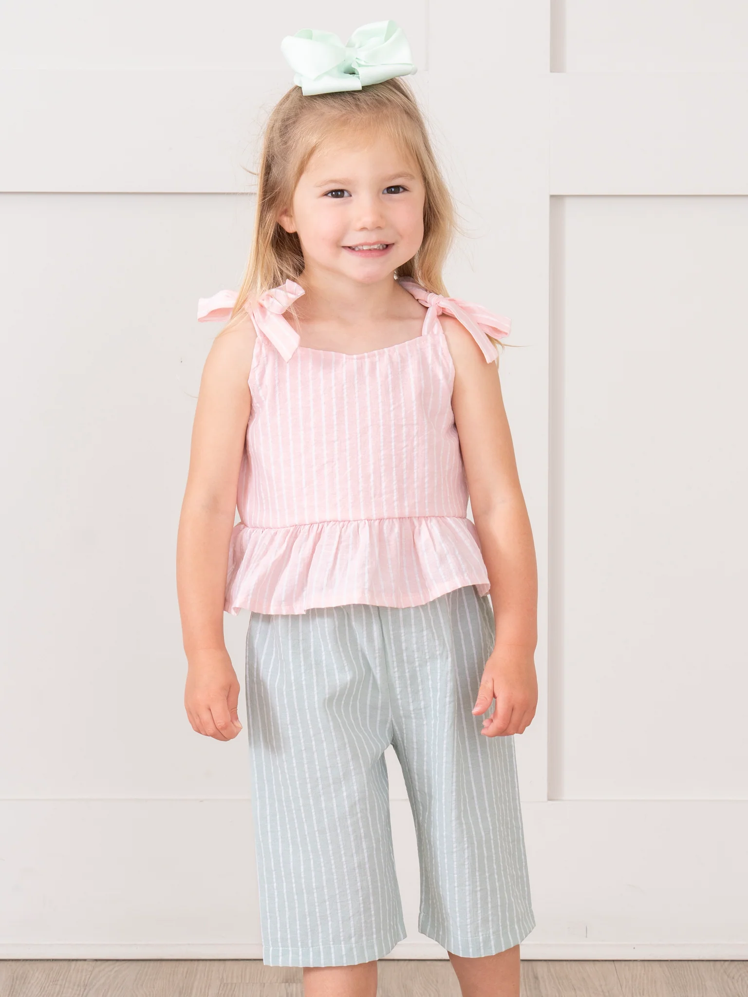Striped Pastels Peplum Ruffle Outfit