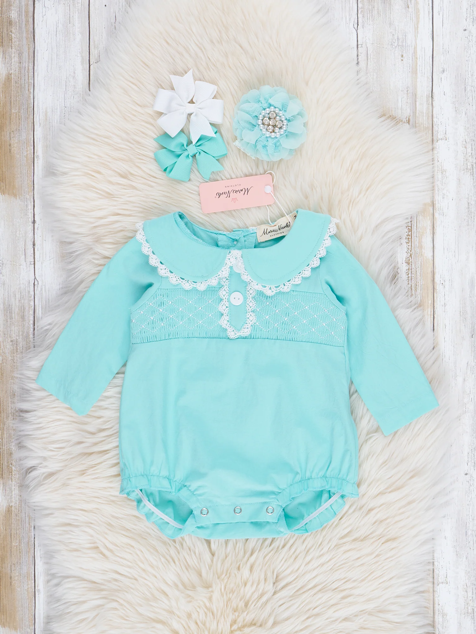 Teal Smocked Pom Pom Bubble Romper