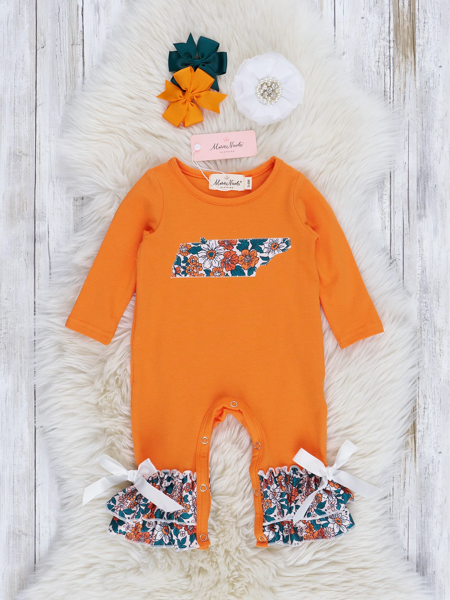 TN Orange Floral Ruffle Romper