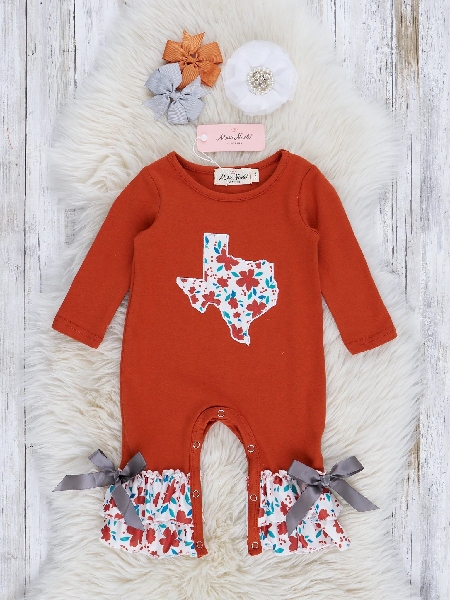 TX Burnt Orange Floral Ruffle Romper